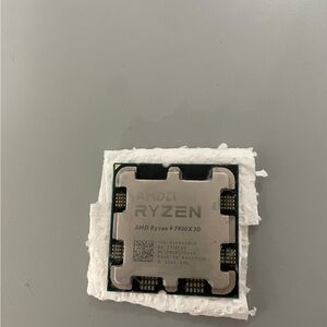 AMD Ryzen 9 7900X3D Processor - Silver and Black
